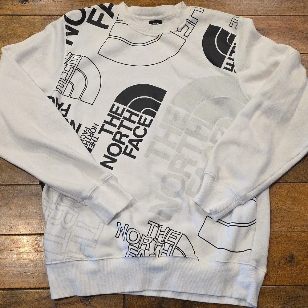 The North Face Men's White and Black All Over‎ Graphic Sweatshirt M
